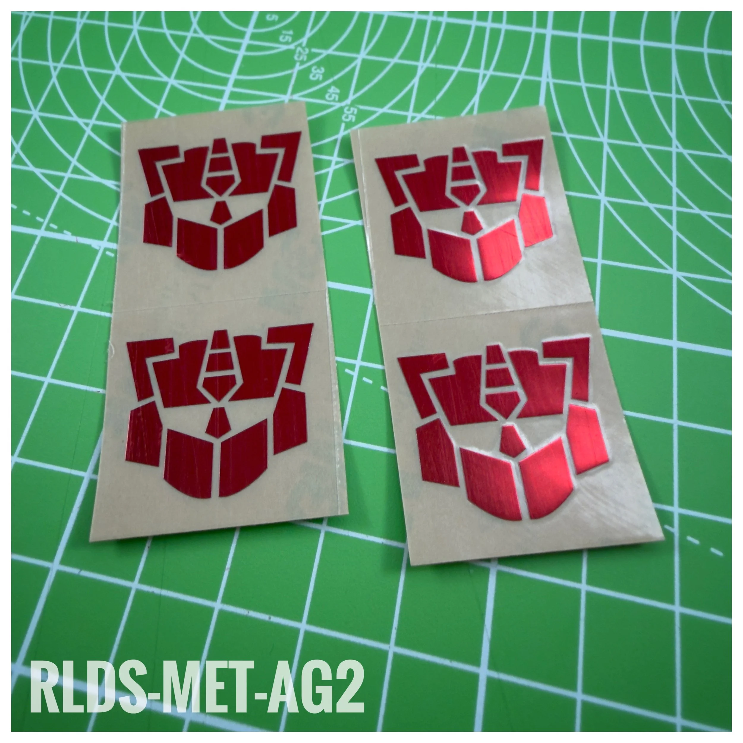 RLDS-MET-AG2 - Oversize Metallic G2 Bot Logos, Red on Clear
