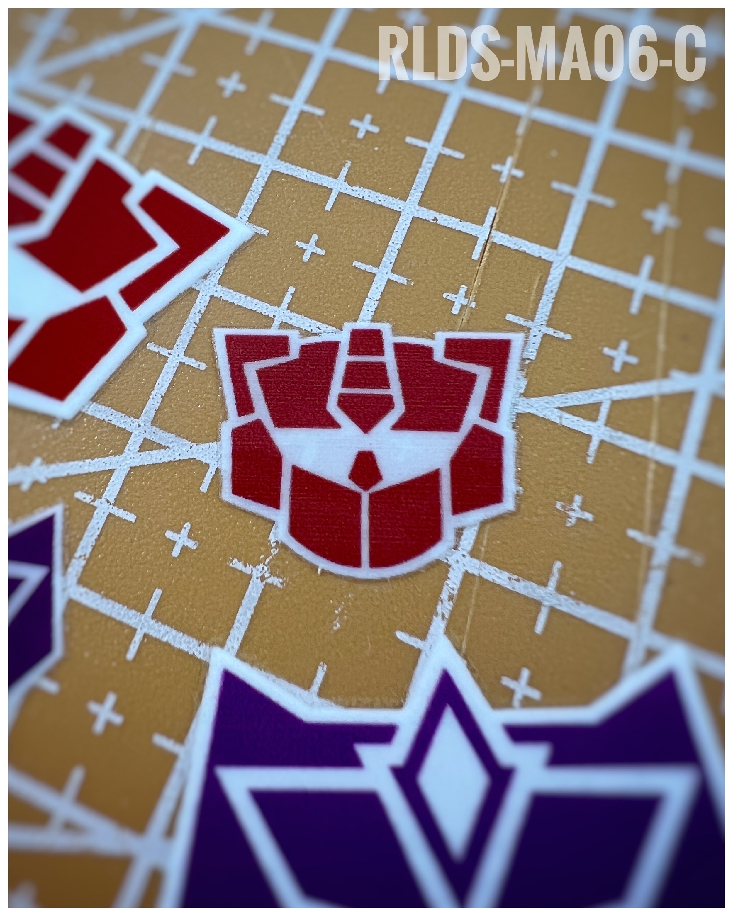 6 x medium G2 Bot dry rub transfers, Red with White background.