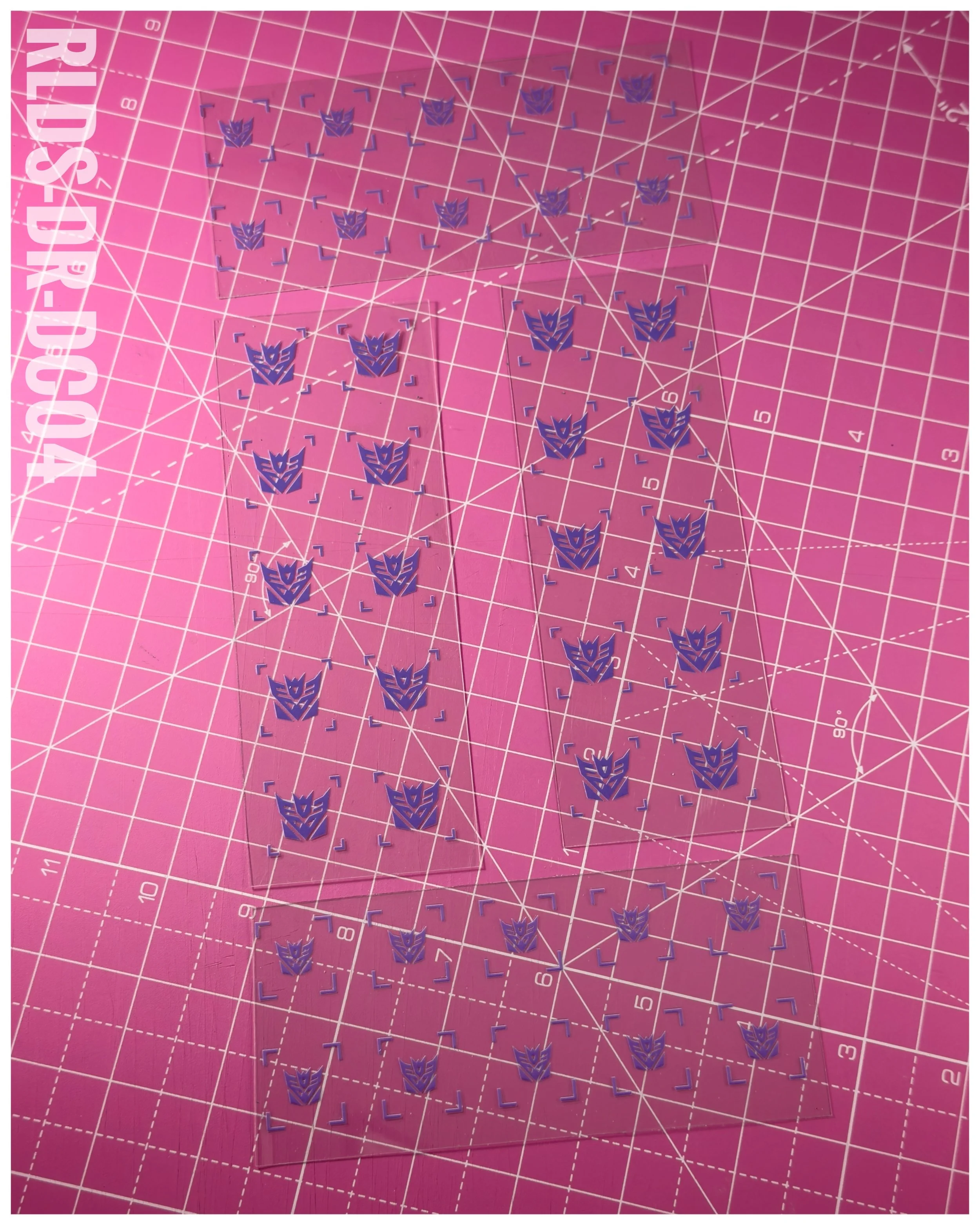 40 x Con UV DTF dry rub transfers, Toon Style, Purple with Clear background.