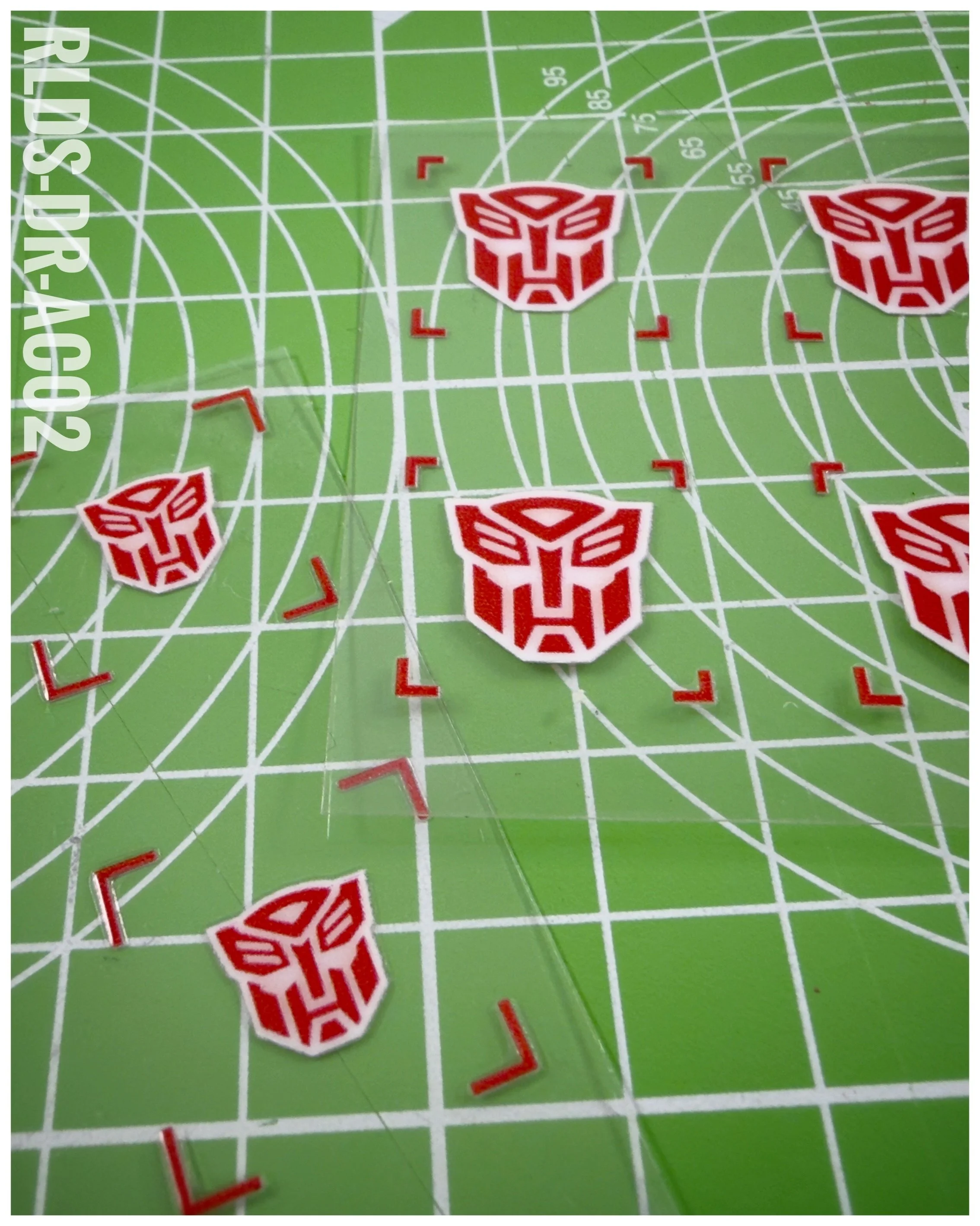 40 x Bot UV DTF dry rub transfers, Toon Style, Red with White background
