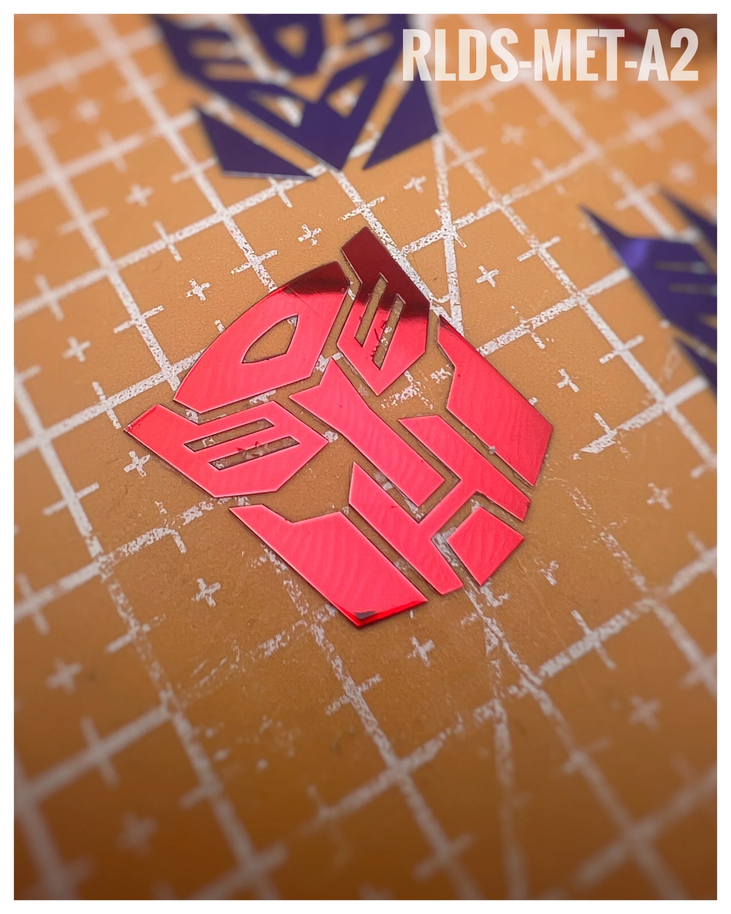 4 x large Metallic Bot dry rub transfers, Toy style, Metallic Red with Clear background.