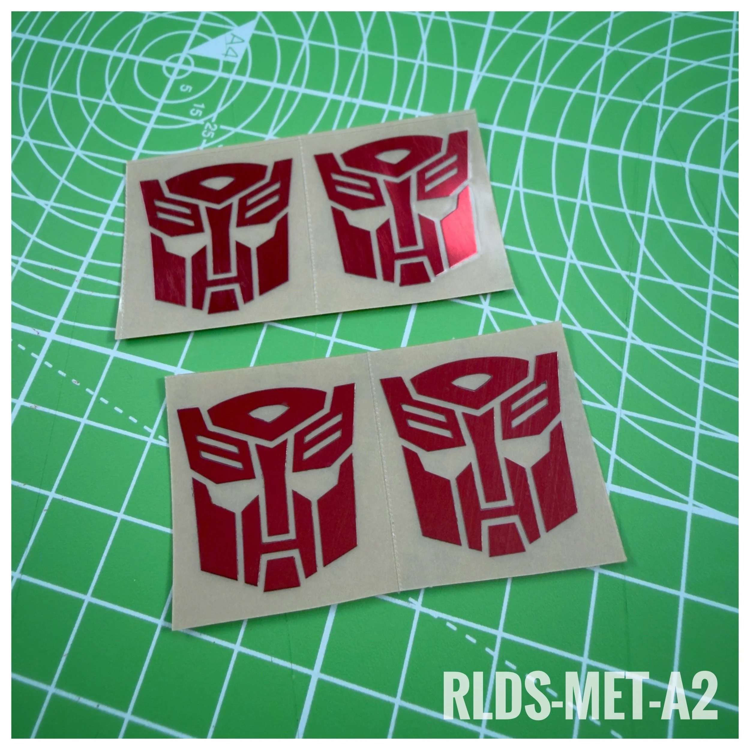 RLDS-MET-A2 - Metallic Oversize Bot logos, Red on Clear
