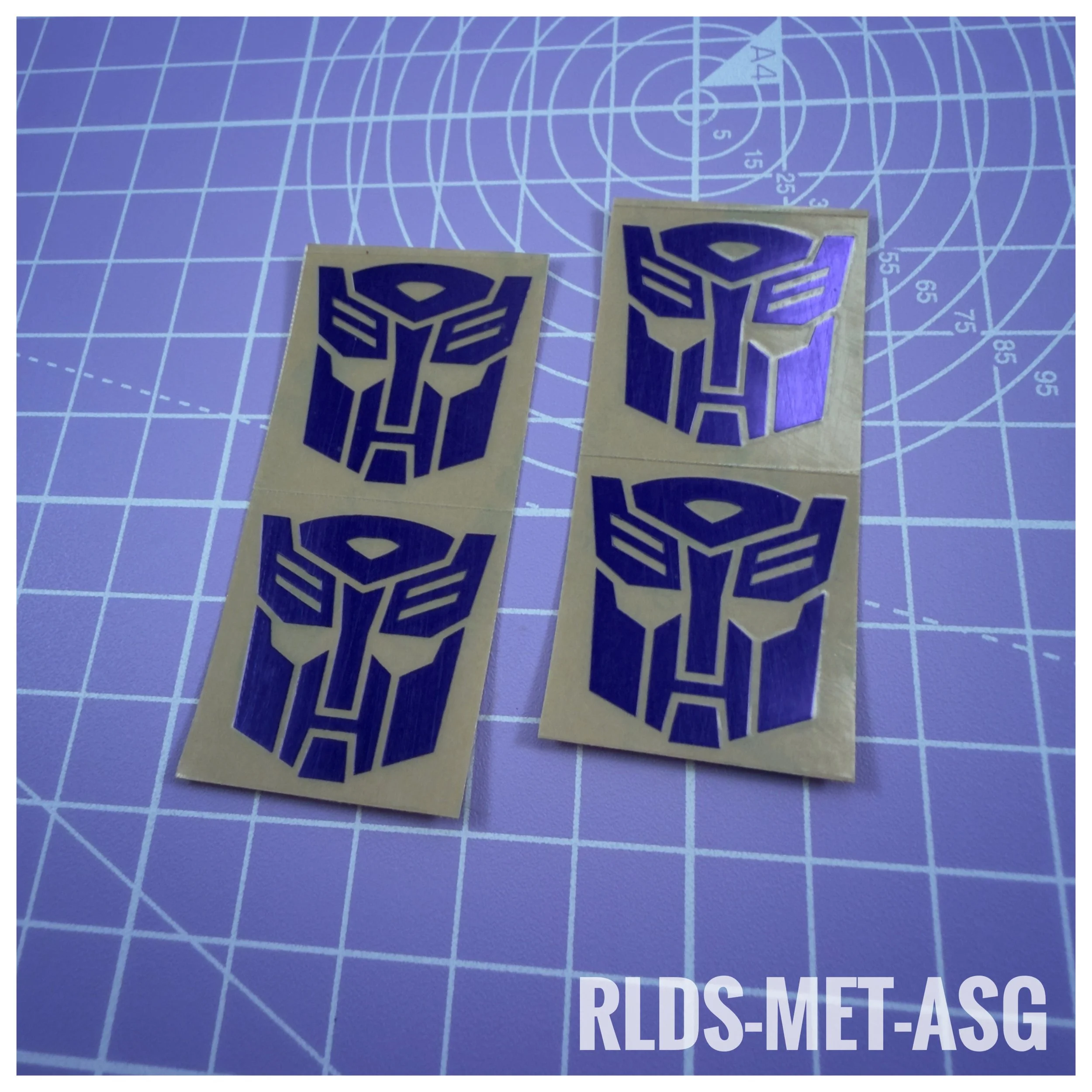 RLDS-MET-ASG - Oversize Metallic Shattered Glass Bot logos, Purple on Clear