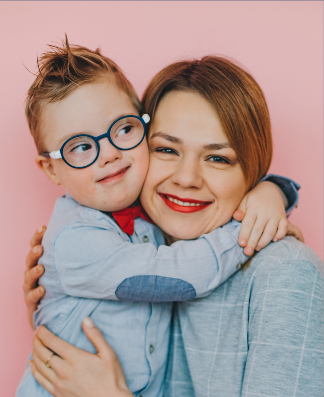 Young boy with Down syndrome and his mom