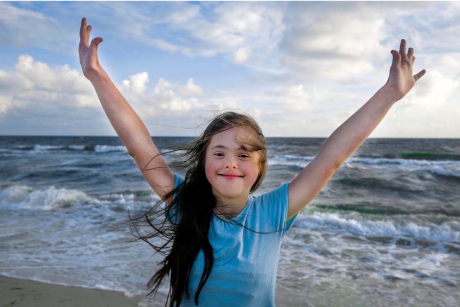 Teen with Down syndrome at the beach