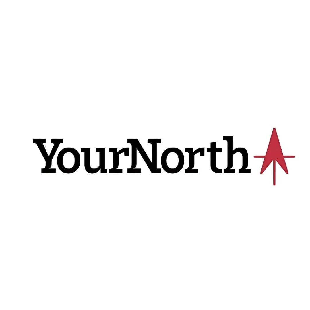 Logo with the text 'YourNorth' and a red arrow pointing upward at the end of the word.