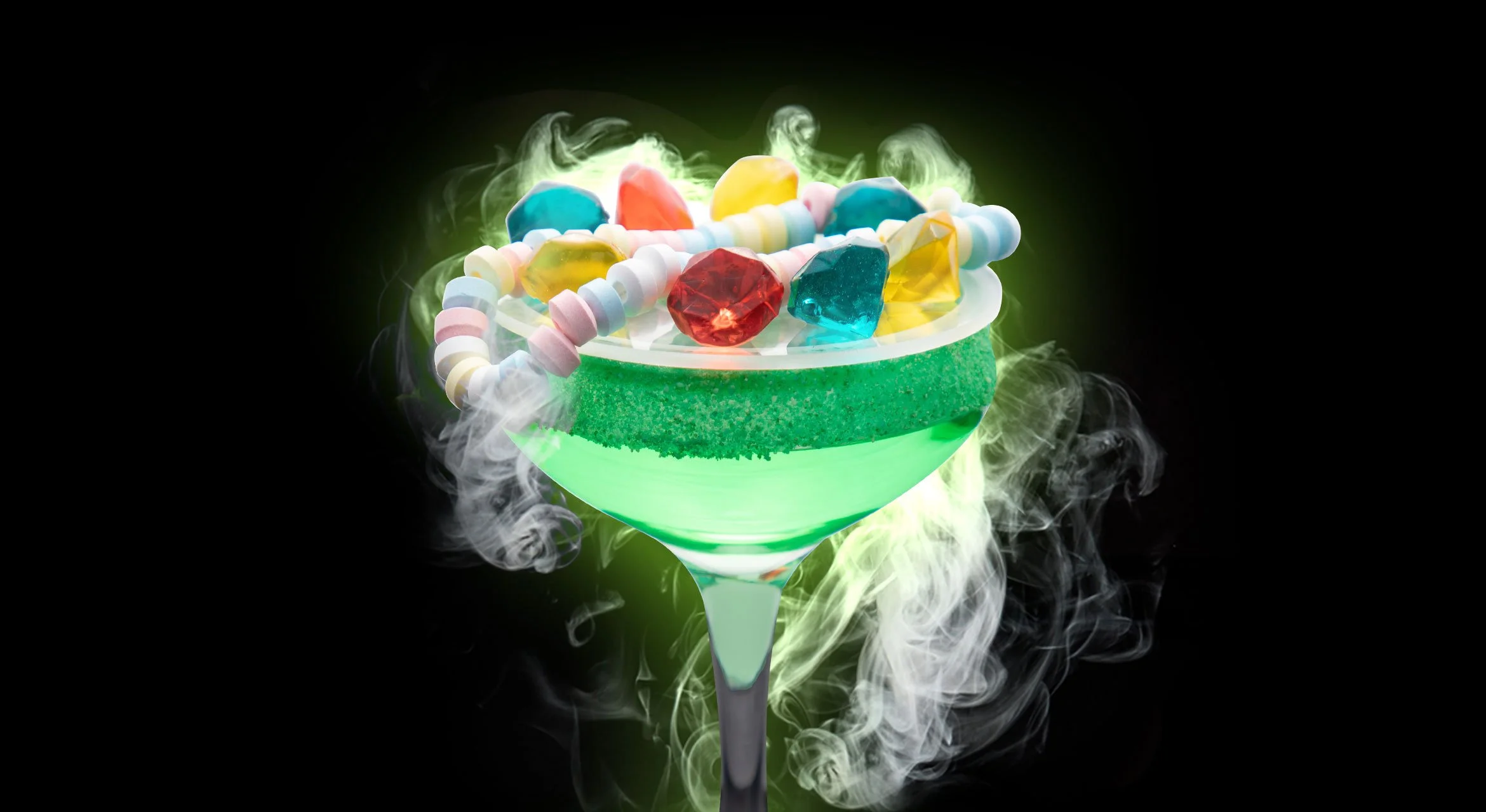 DON'T BE FOOLED BY THE ROCKS THAT I GOT - Smirnoff™ Apple Vodka, Melon Liquor, Apple Liquor, Peach Schnapps, Sweet and Sour Mix, and Sprite. Coupe is rimmed with green apple Pucker Powder® and adorned with gummy jewels and a candy necklace.