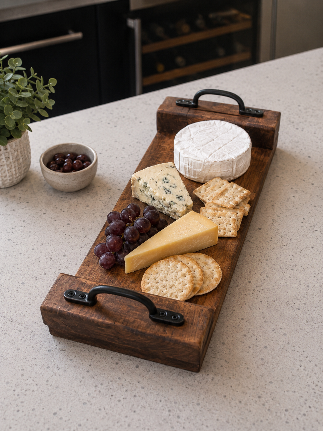 Handmade wooden serving board for cheese and snacks