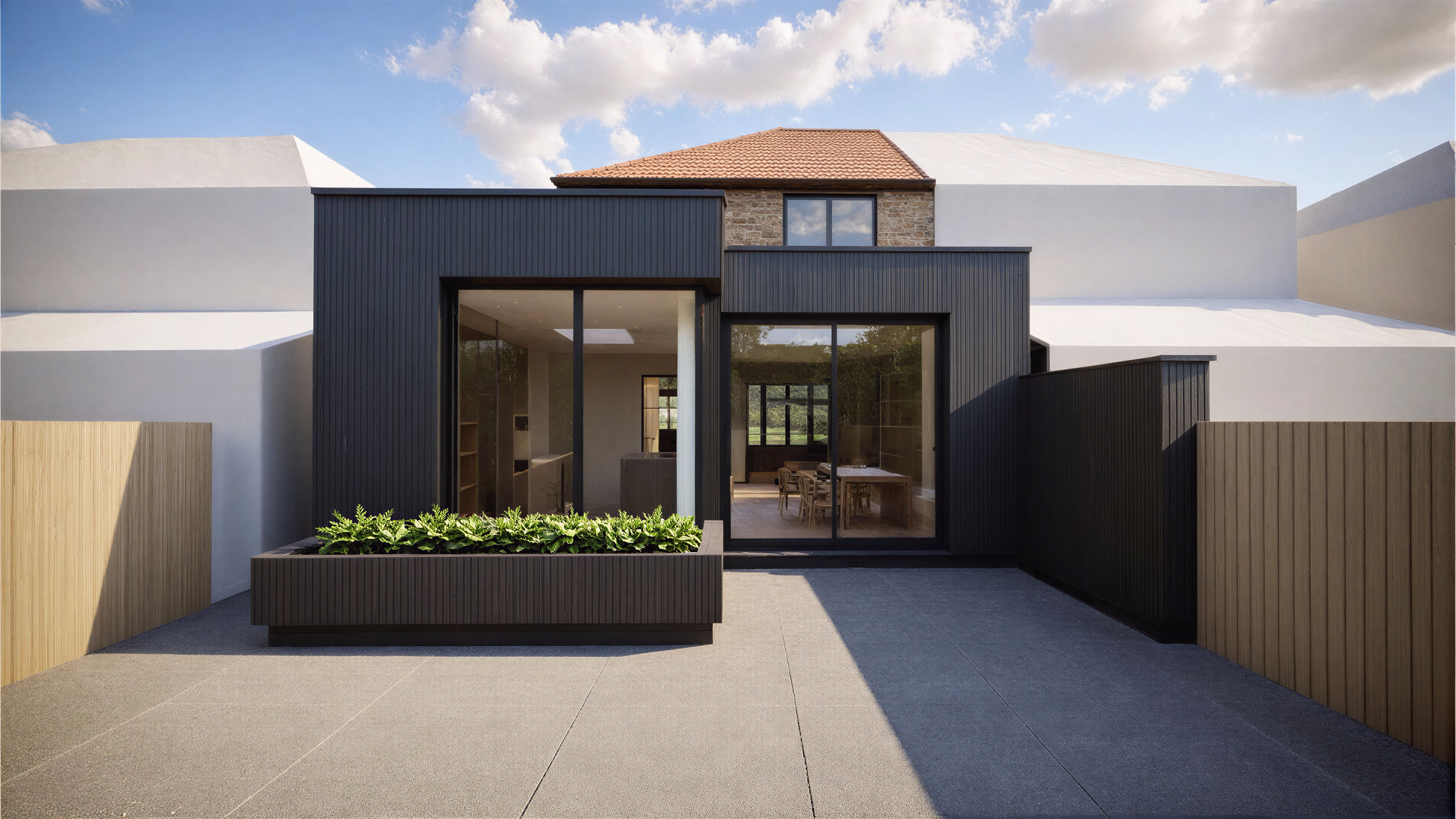 Modern charred timber-clad extension in Withington, Manchester by KLN Architectural Design