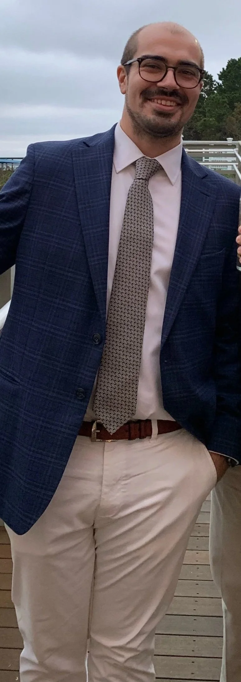 Matthew Waldron, Esq. wearing a suit