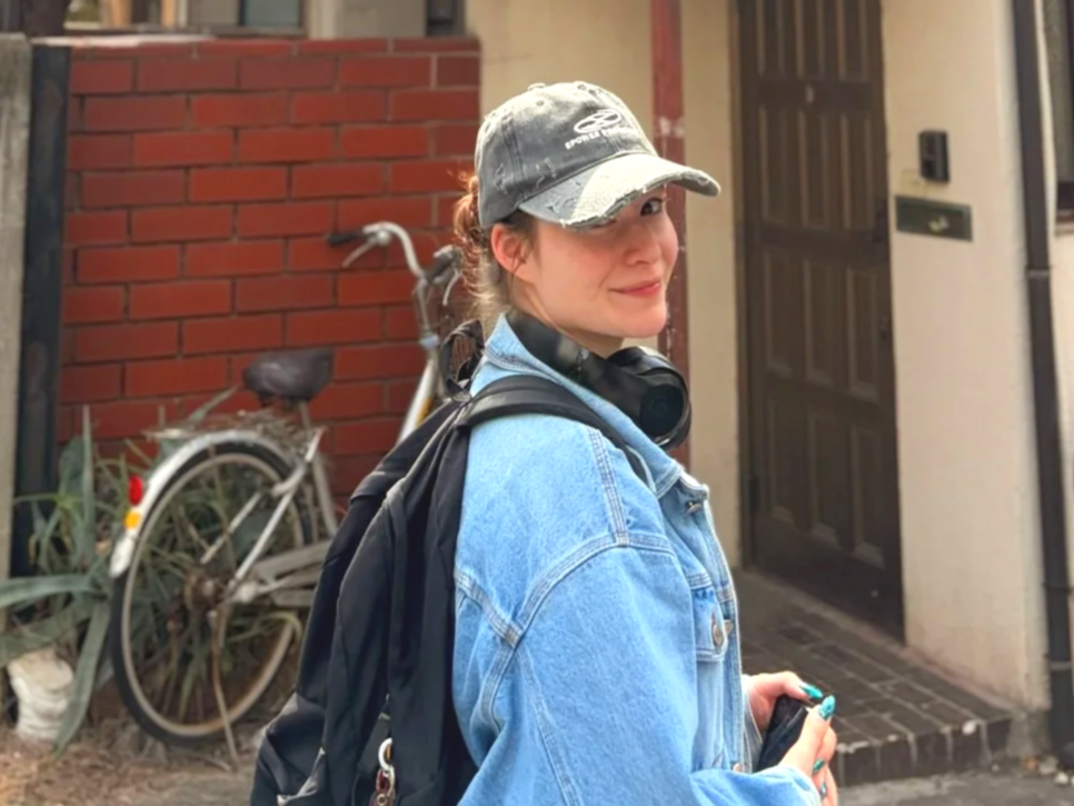 Sophie Conklin smiling in the city.