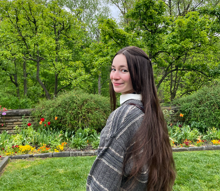 Sophie Conklin enjoying a garden.
