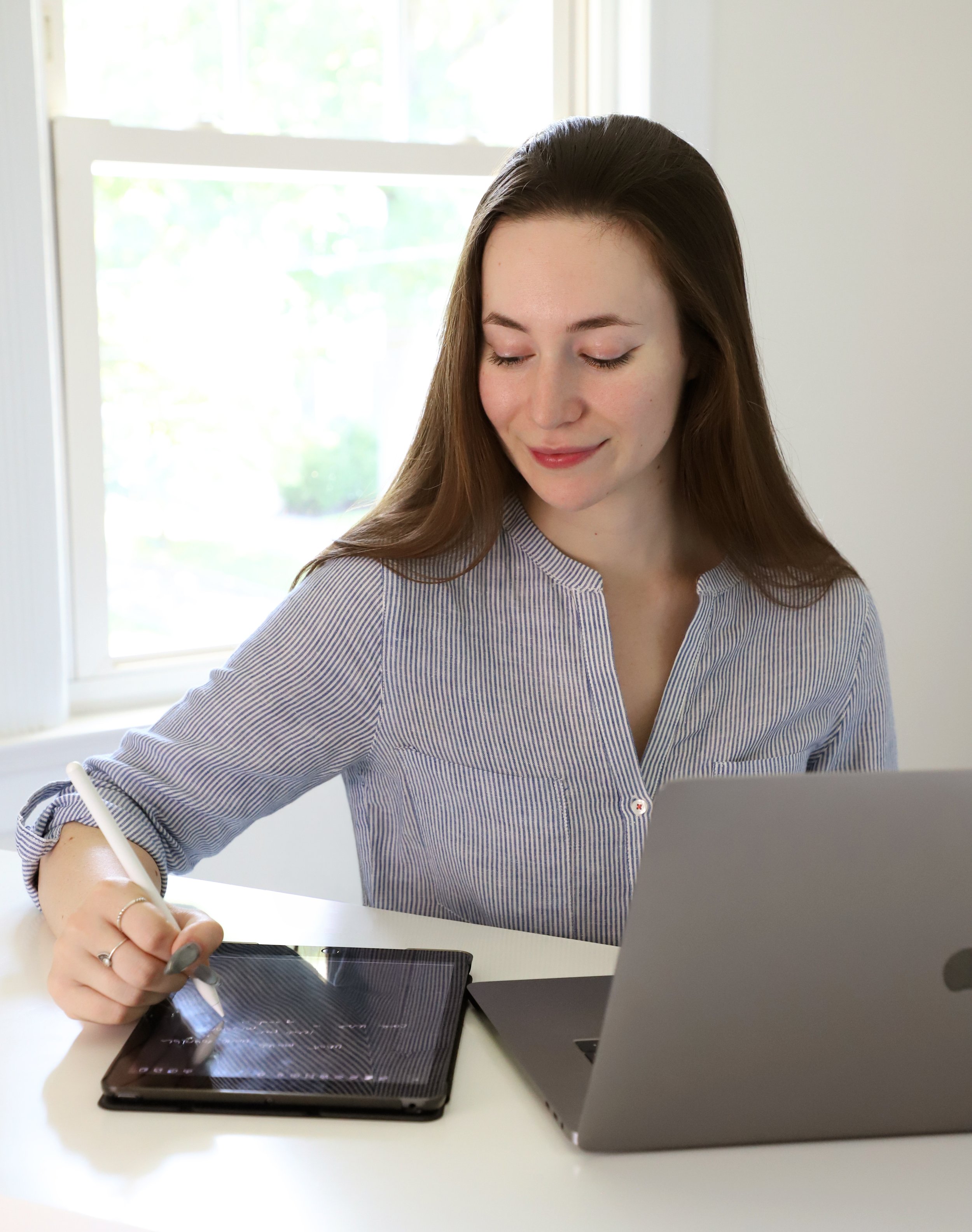 Sophie taking notes during virtual session