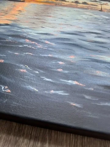 Close-up of Solace at Sunset oil painting showing textured dynamic clouds and golden sunbeams over the Caribbean ocean.