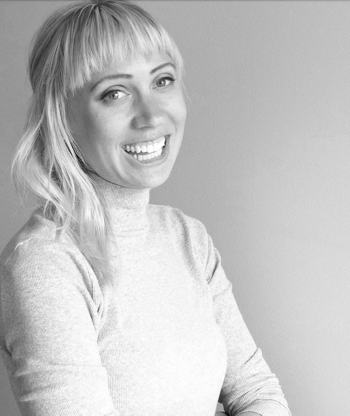 Acupuncturist smiling at camera