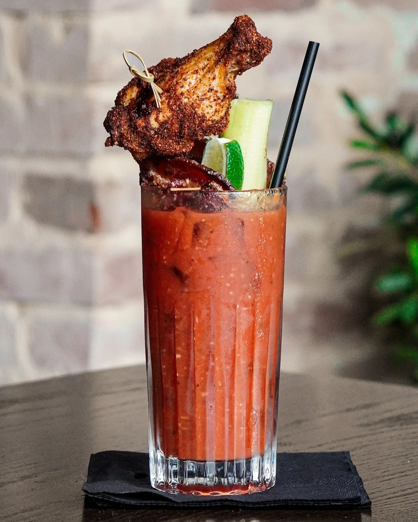 Sunday&rsquo;s best? You&rsquo;re looking at it. 🍗🍅🍹

Our Bloody Mary doesn&rsquo;t mess around, stacked high with bold flavor, candied bacon, fresh garnish, and yes&hellip; a whole dang wing on top.

Come sip something spicy and settle in&mdash;w