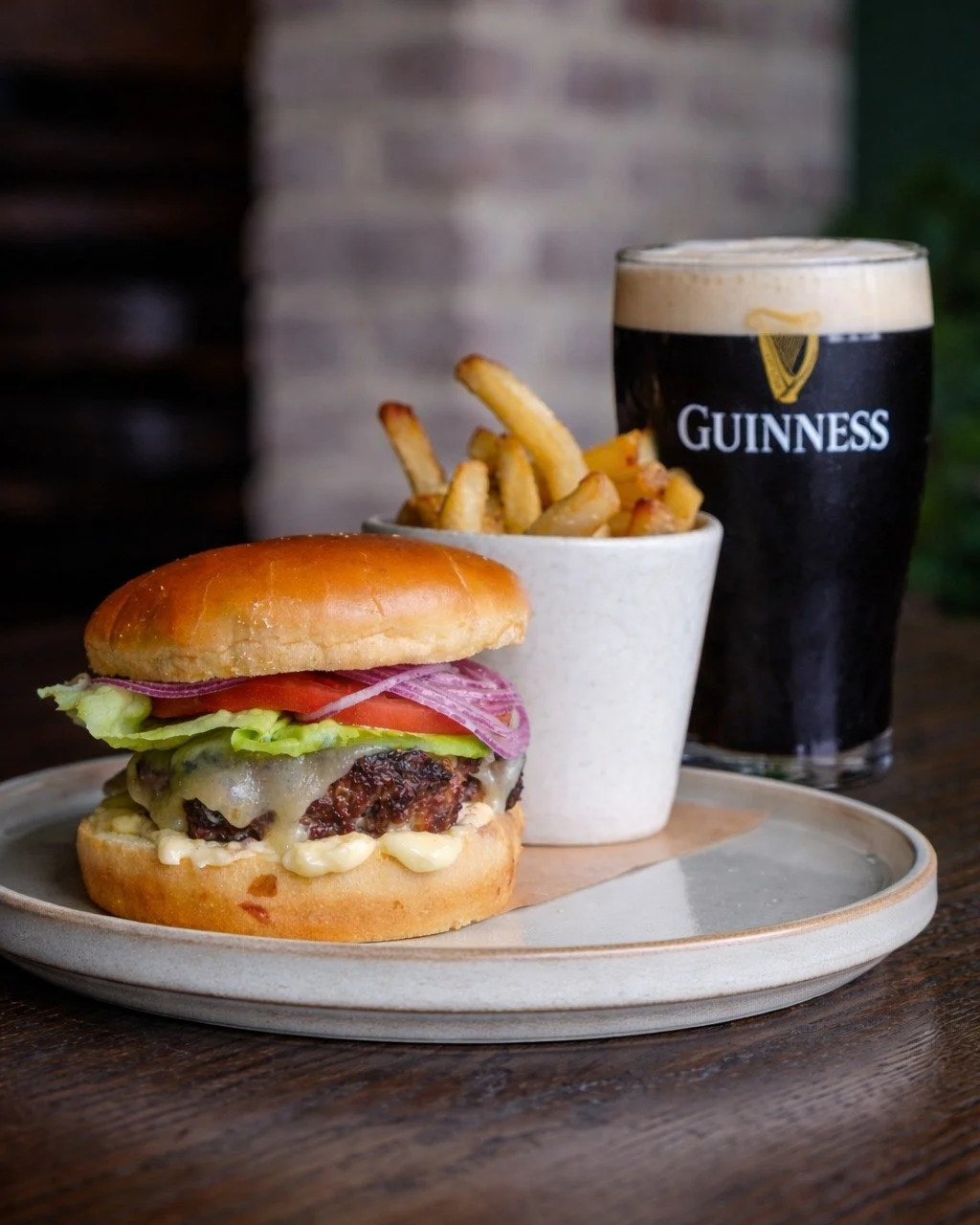 4&ndash;6PM just got better. 🍺🔥

Swing by the bar side and grab our $20 Amsden Hour special:

A cold pint of Guinness + your pick of 🍔 an Old Fashion Burger
or🍗 a full order of wings.

No frills. No fuss. Just a proper pint and something great to