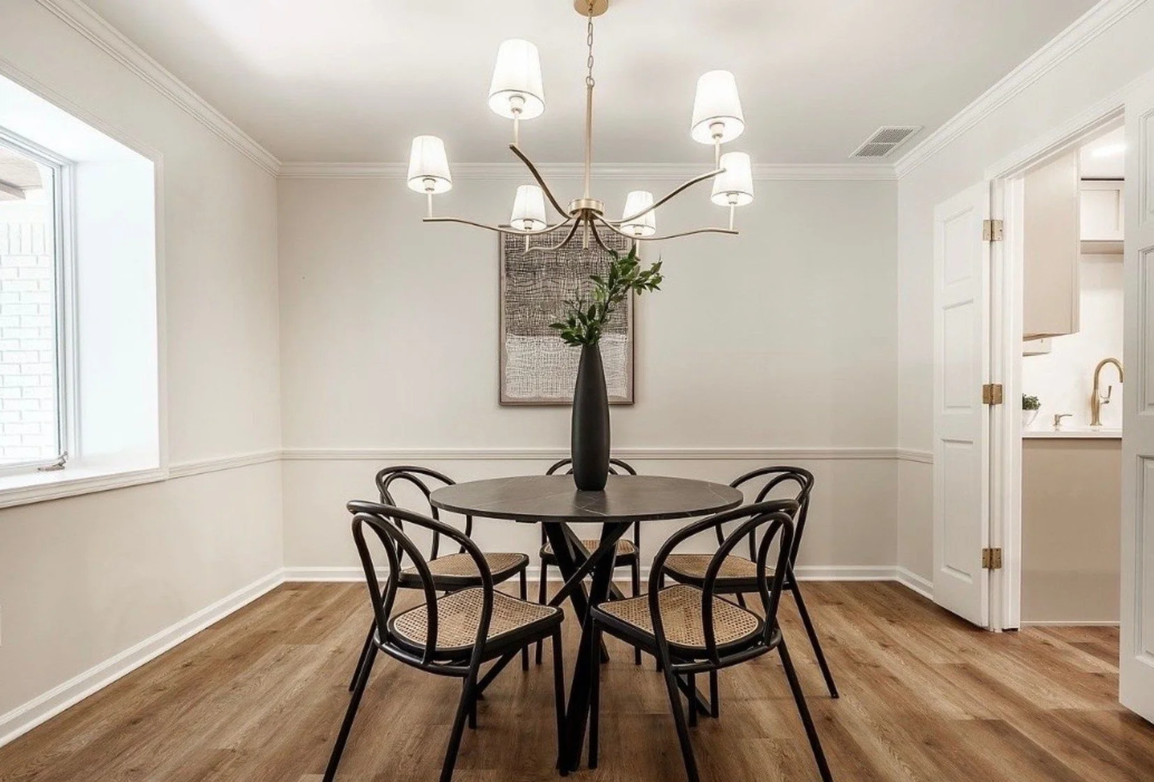 Austin Brown luxury vinyl plank flooring in a dining room – Build Pro factory-direct LVP, Carmel Indiana