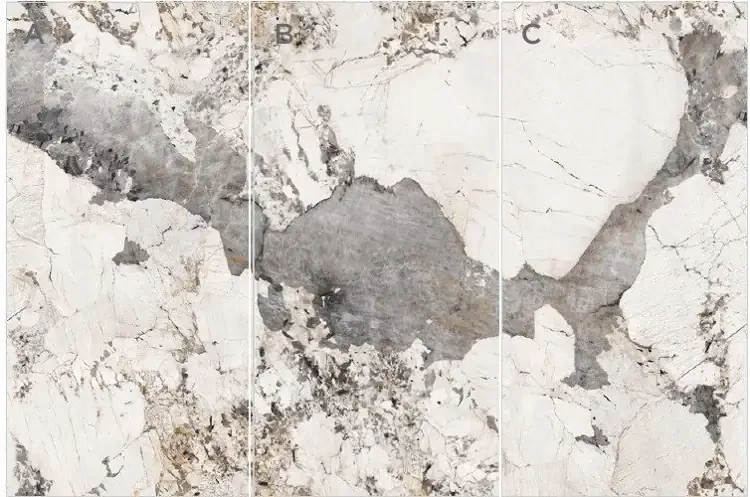 Pandora sintered stone slabs — bright white base with bold grey and gold veining, glossy finish