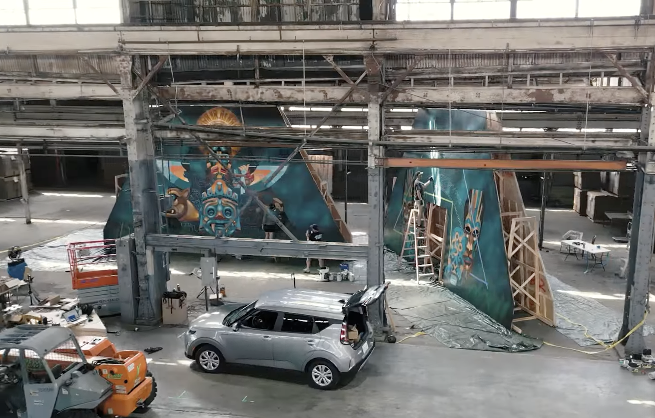 Multiple pyramid modules painted and staged in the shop—modular assembly streamlining transport and on-site install.
