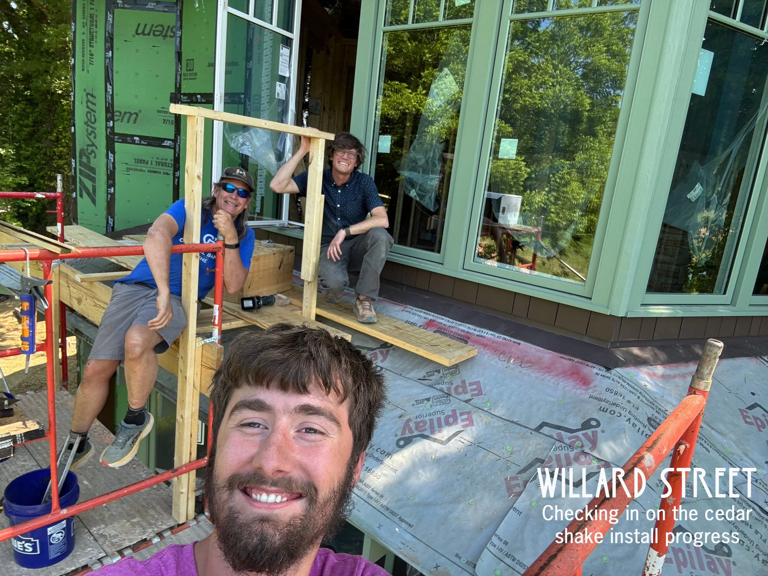 Trey Cole and nephew, Glenn Johnson, are tackling the tedious installation of the pre-finished cedar shake siding. Glad I'm just checking in.