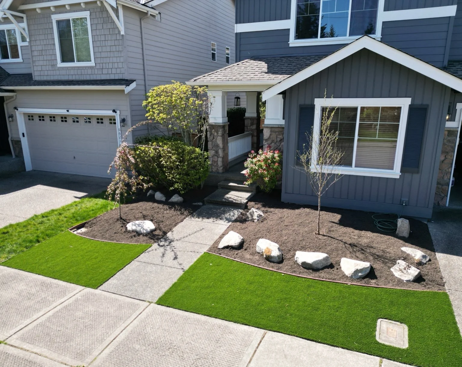A modern front yard featuring landscape designer services in Seattle, WA
