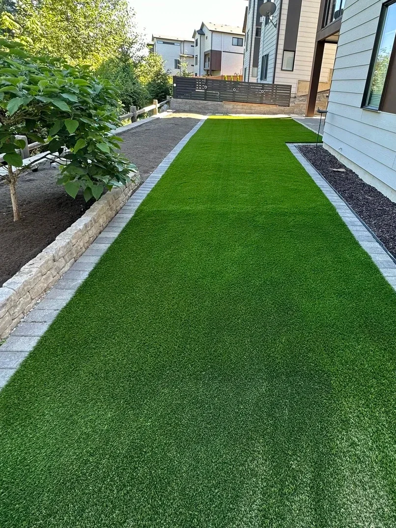 Artificial turf installed for a low-maintenance backyard in Sammamish, WA