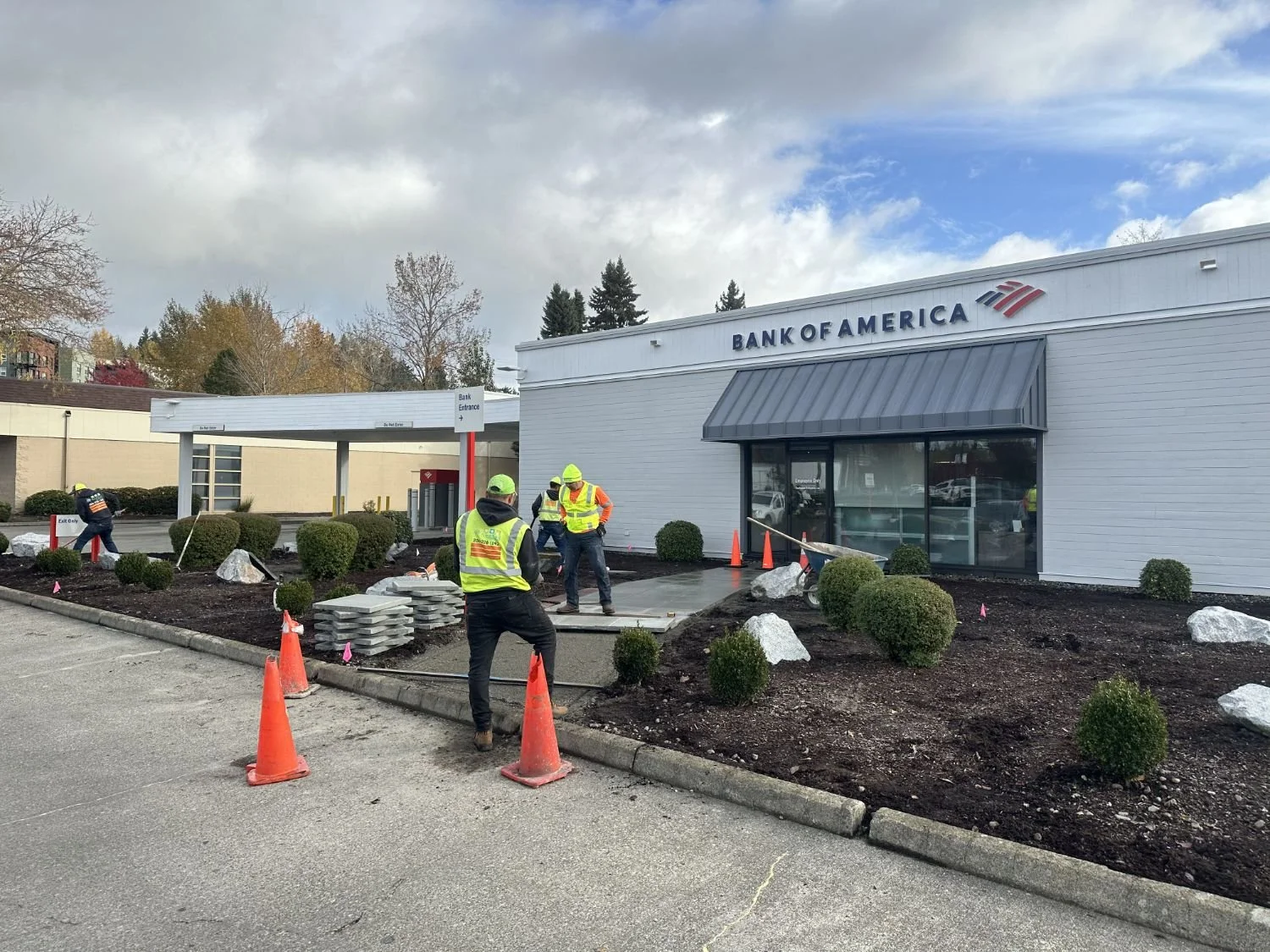 NELS commercial crew installing hardscape pavers at a Bank of America branch in the Seattle area, WA