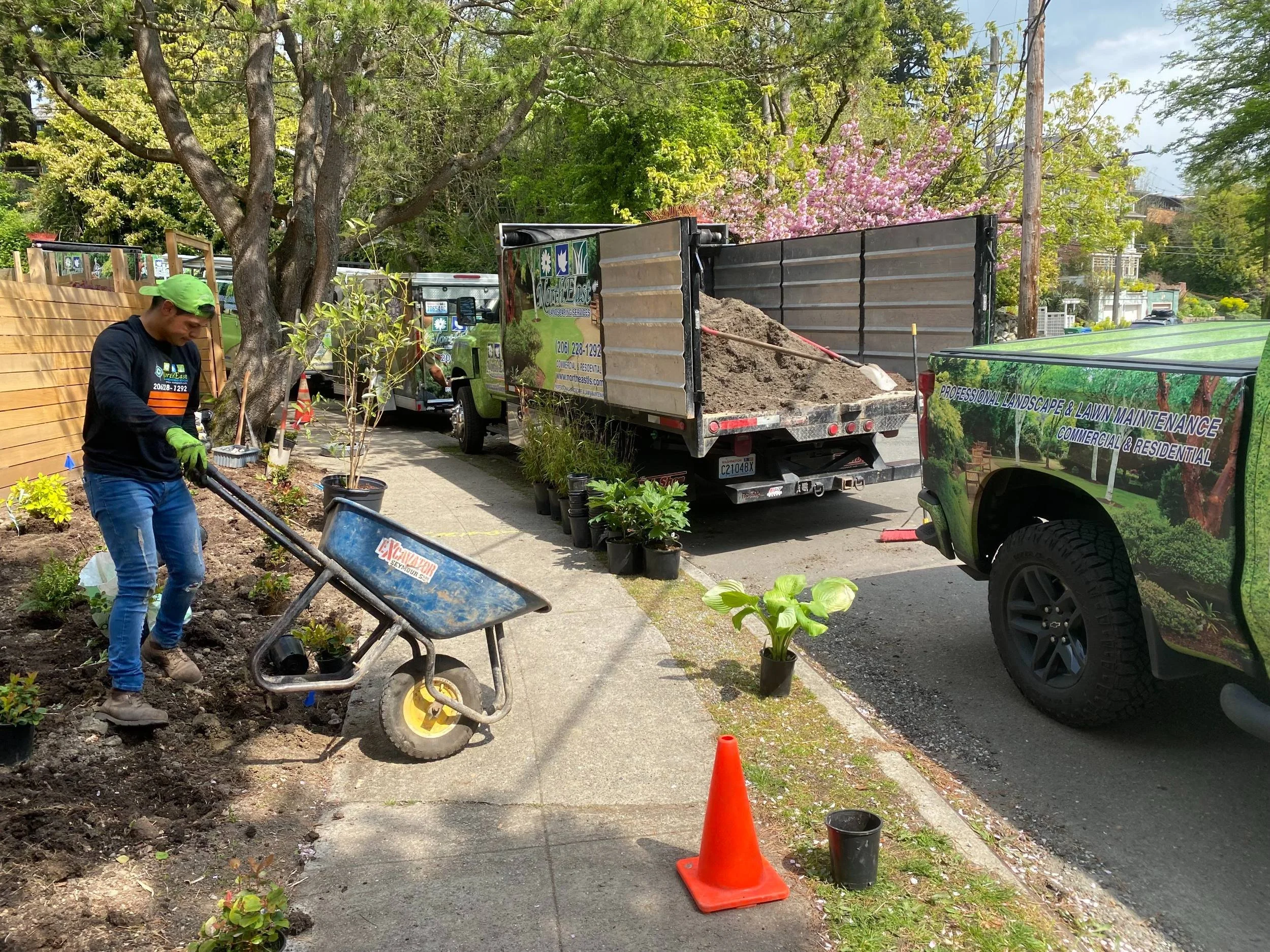 Commercial landscaping crew performing grounds maintenance in Snohomish County, WA