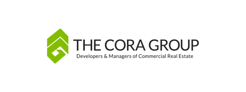 Logo for The Cora Group, a real estate development and management company, featuring a green geometric house icon and black text.