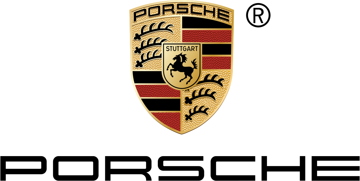 Close-up of the Porsche logo with a gold shield featuring black and red stripes, a black prancing horse, and the word 'Stuttgart' inside a small shield.