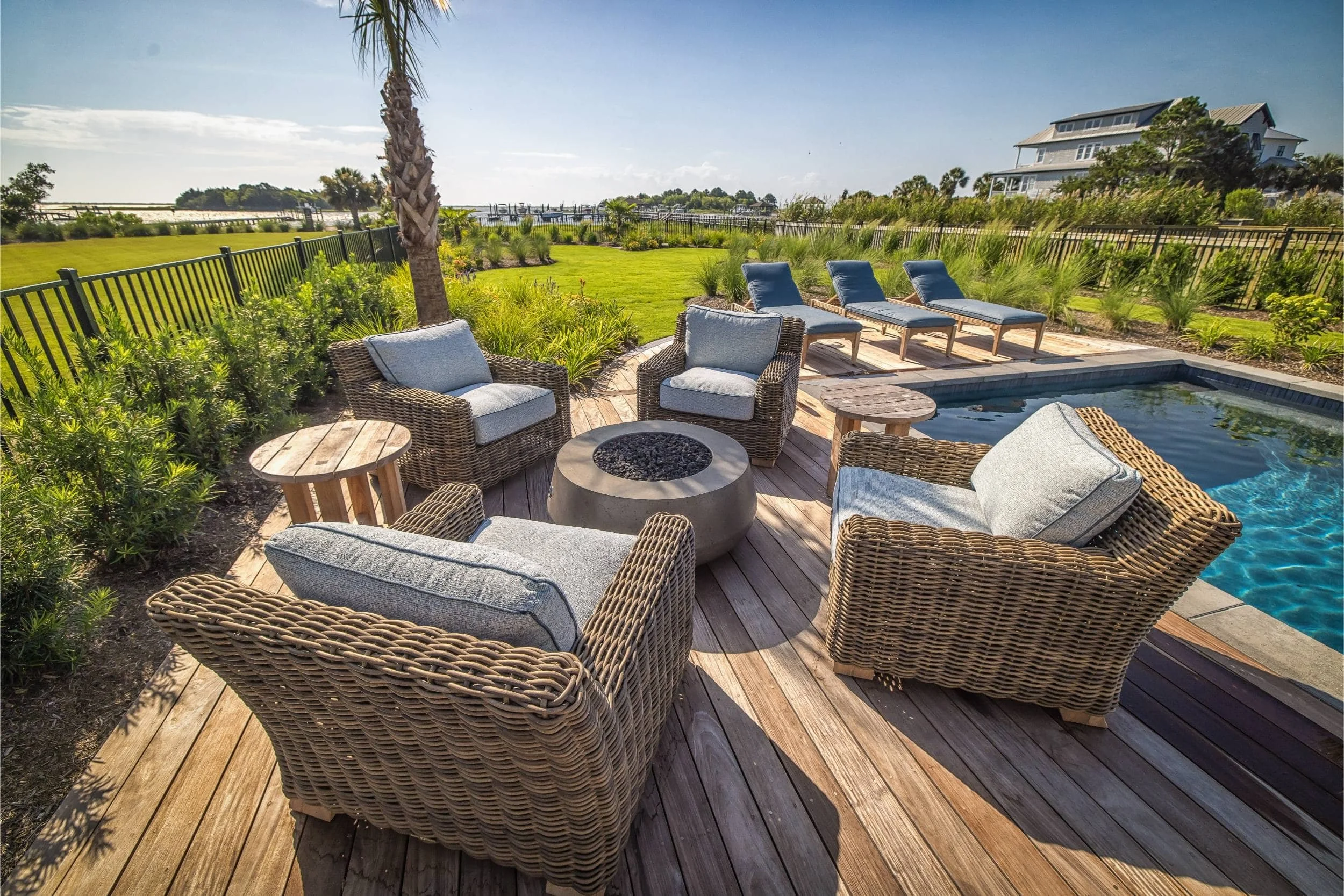 A coastal landscape design with natural plantings and water features in Myrtle Grove, NC