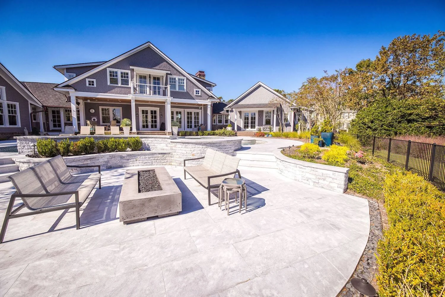 Outdoor fireplace overlooking a paver patio in Carolina Beach, NC