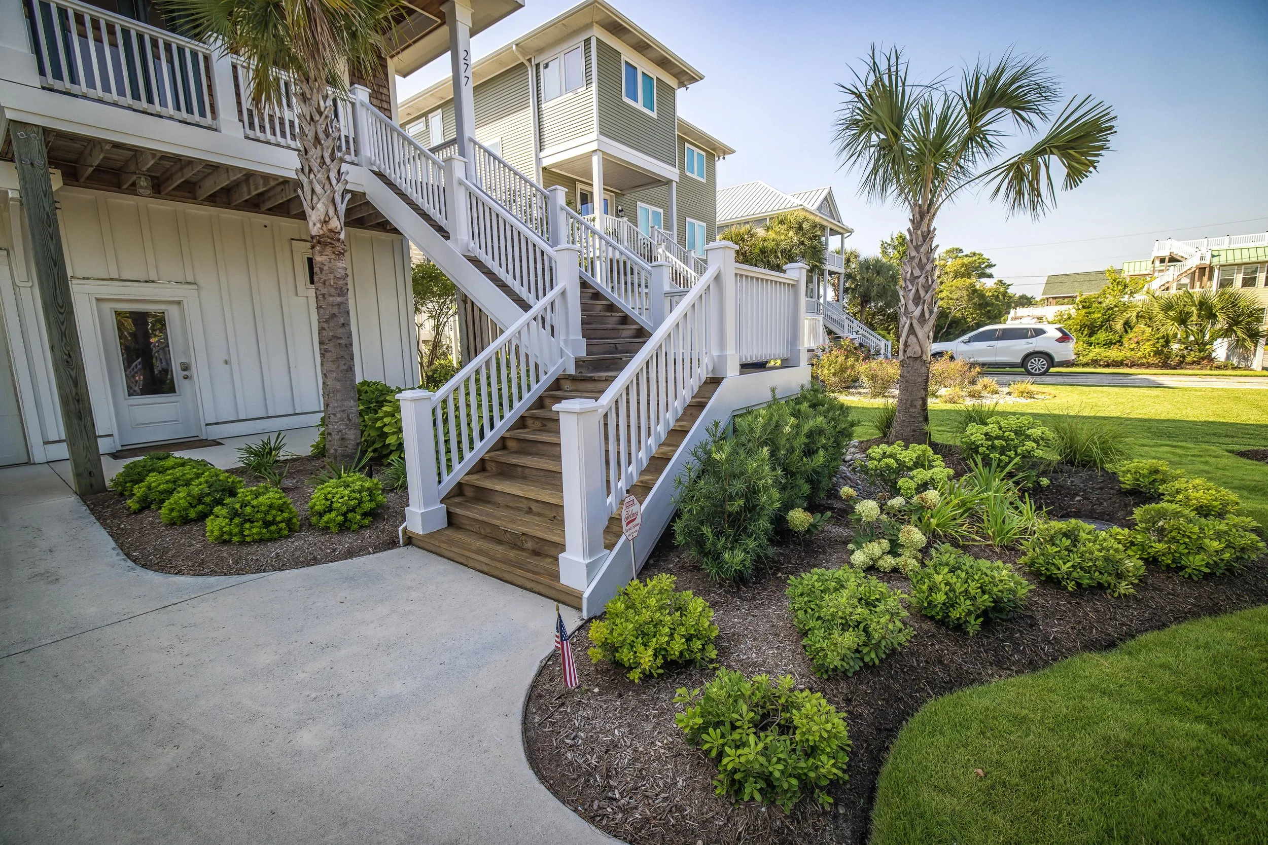Landscape design featuring lawn care improvements in Hampstead, NC