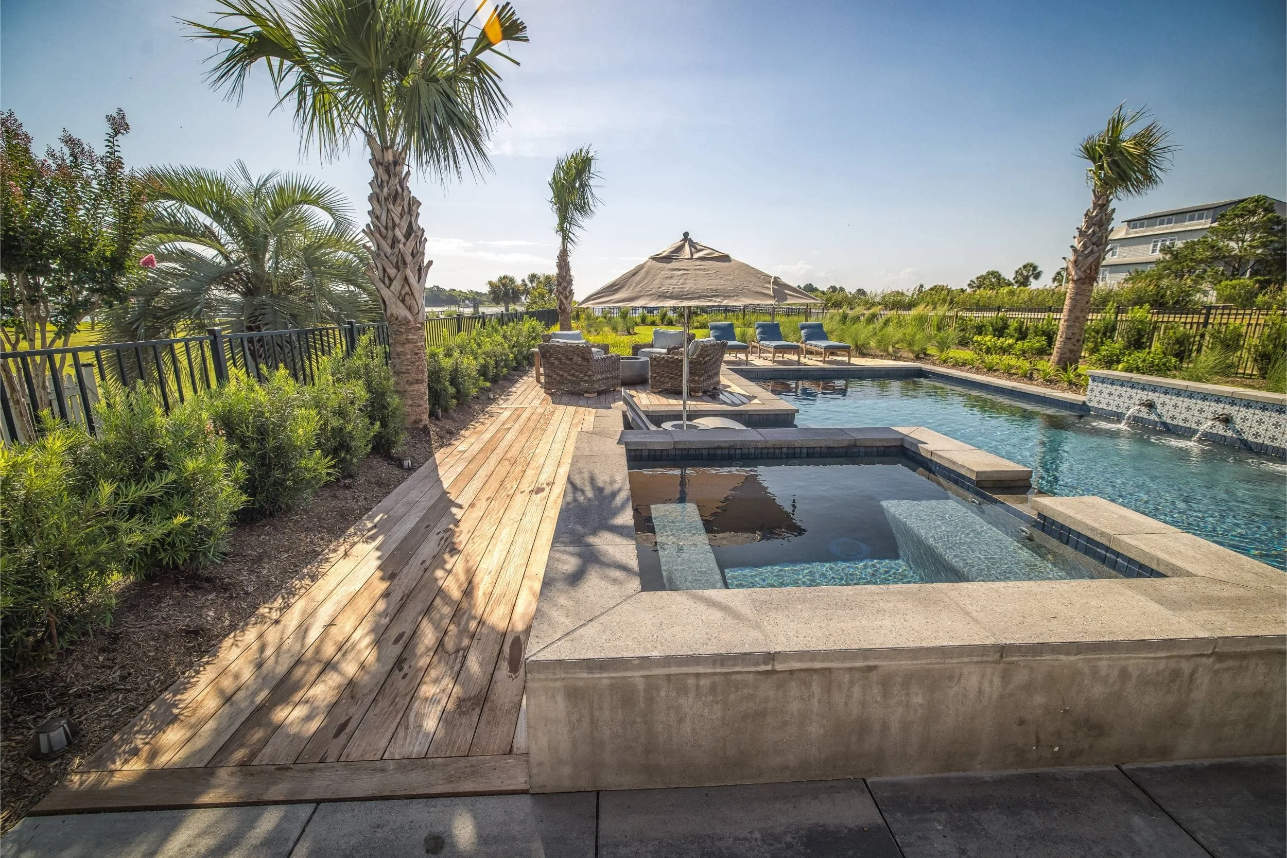 A landscaping near me project with layered plantings and coastal design in Figure Eight Island, NC