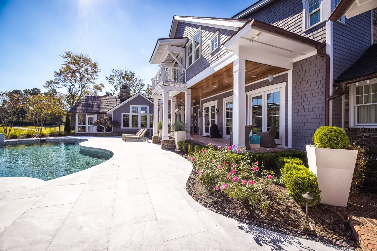 Outdoor living space with coastal landscape design in Wrightsville Beach, NC