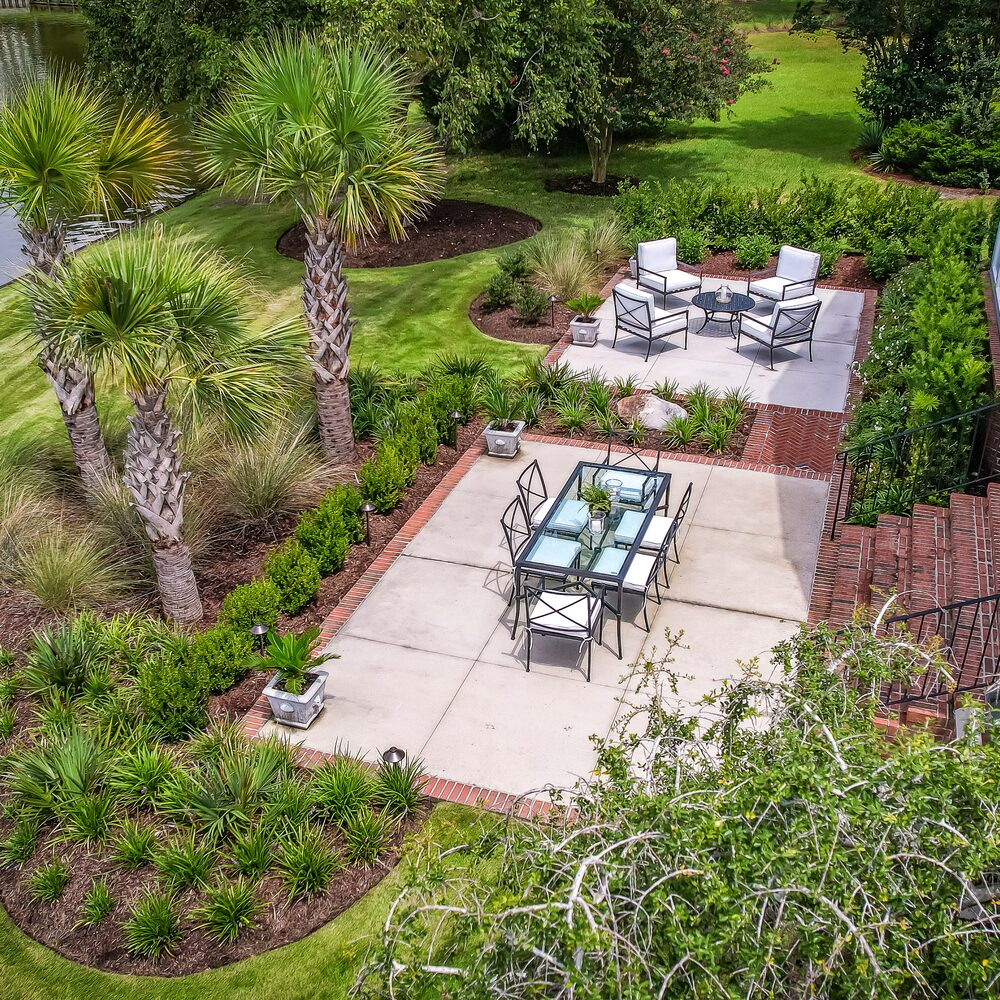 Modern outdoor living space with custom patio design in Wilmington, NC