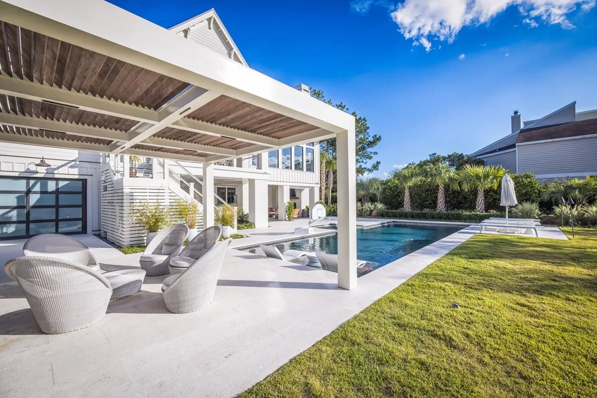 Landscape design with ornamental shrubs and stonework in Landfall, NC