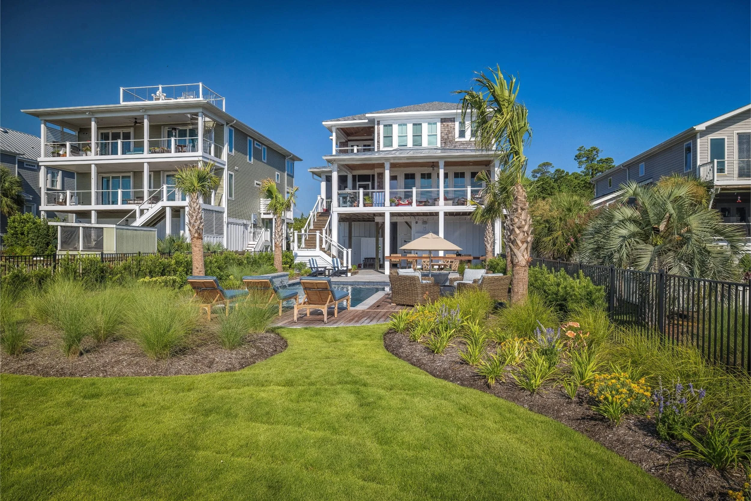 A high-end outdoor kitchen and patio designed for waterfront entertaining in Wilmington, NC