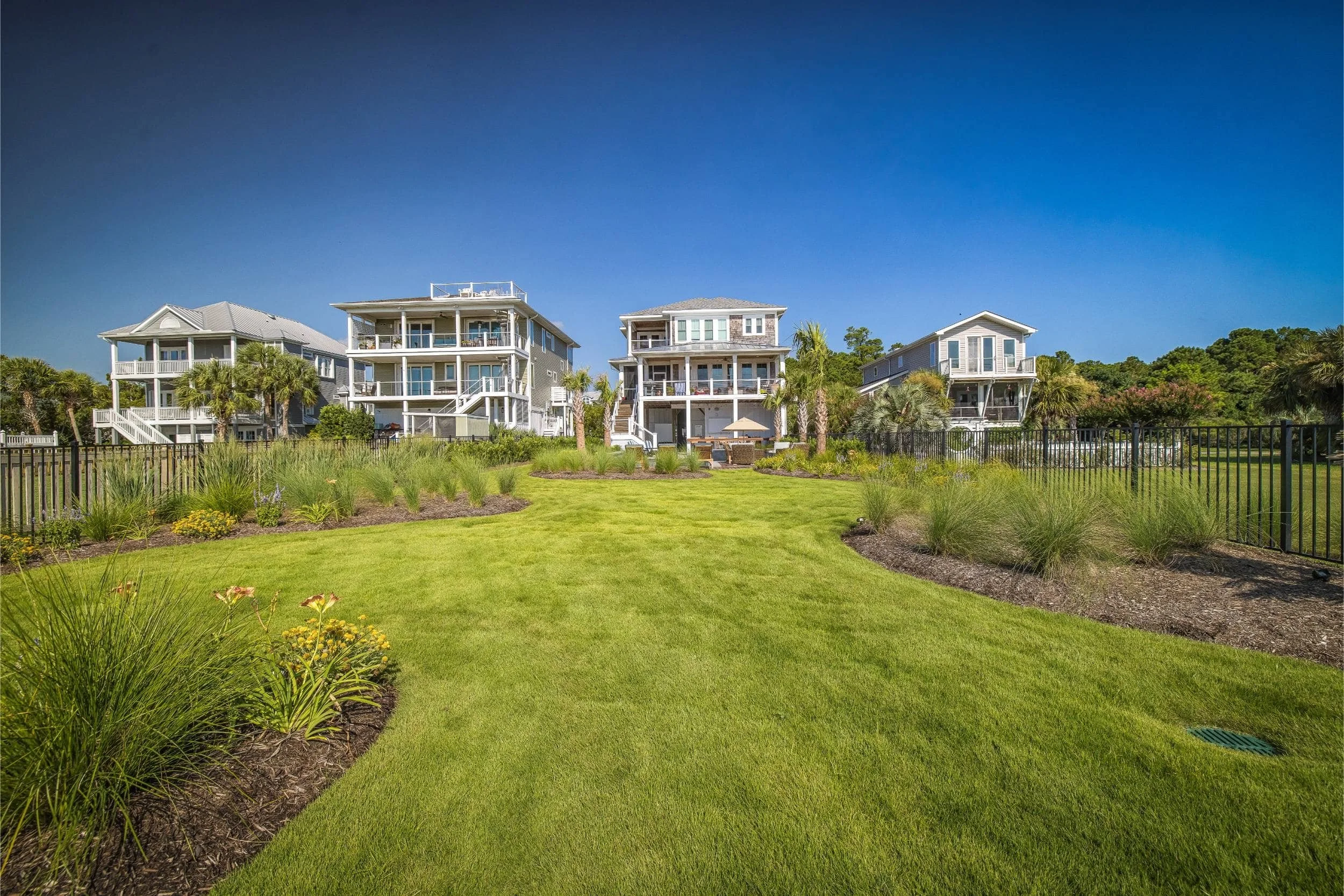 A beautiful patio with outdoor furniture and coastal views in Figure Eight Island, NC