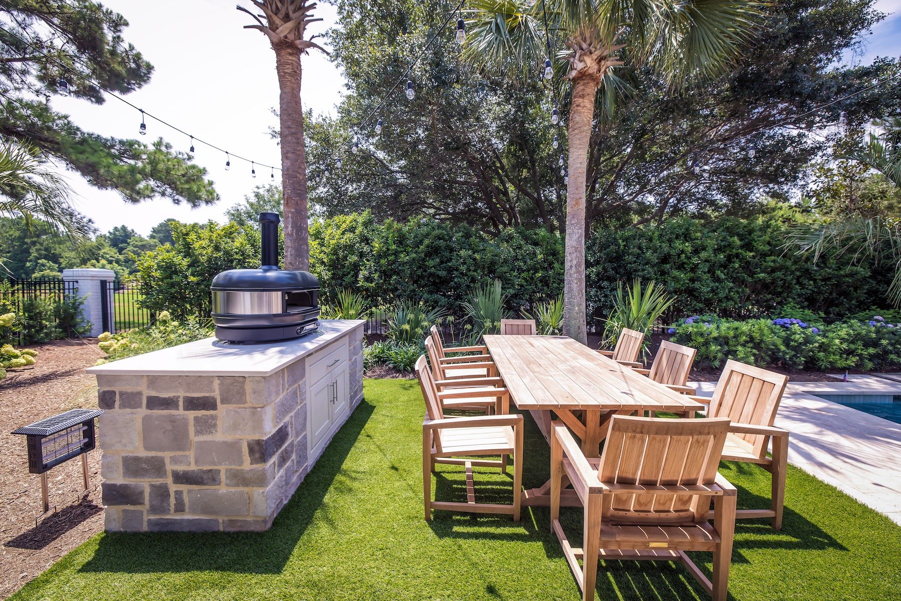 Outdoor smoker by pool in Landfall in Wilmington, NC