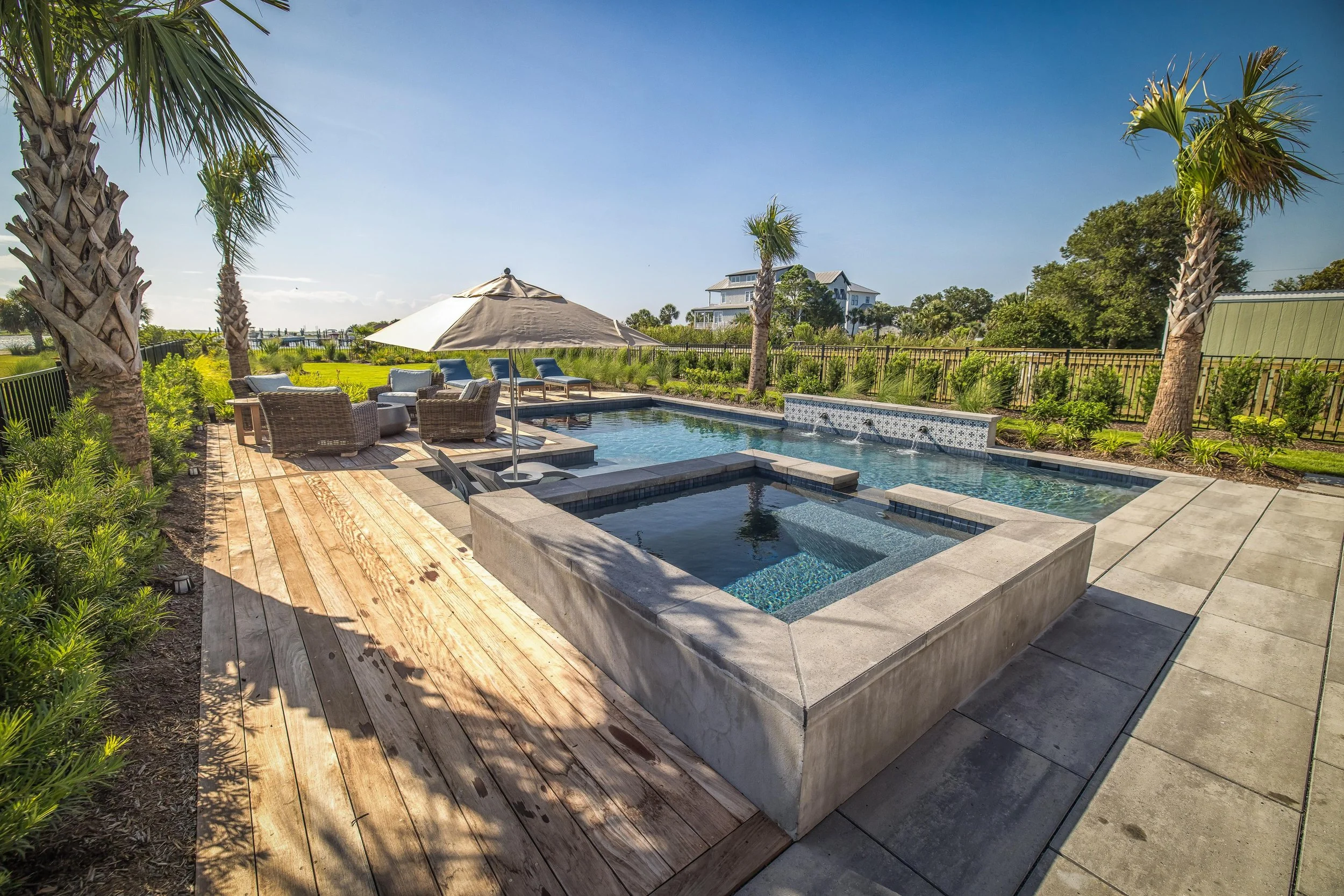 Patio design with updated outdoor lighting in Ogden, NC