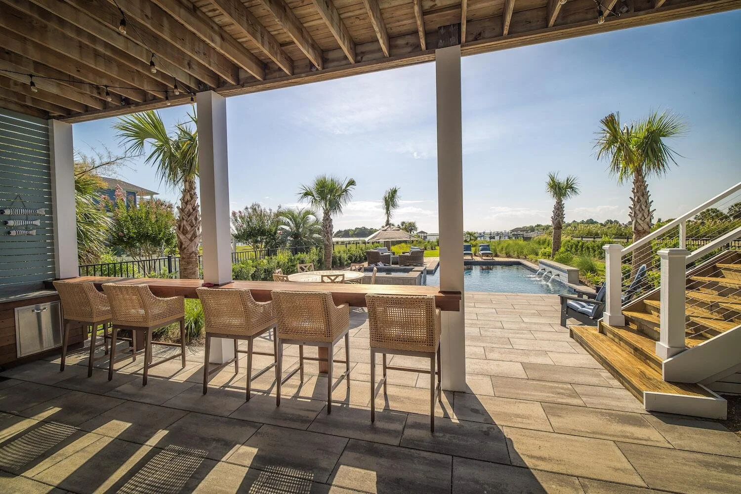 Coastal patio layout with outdoor lighting in Wilmington, NC