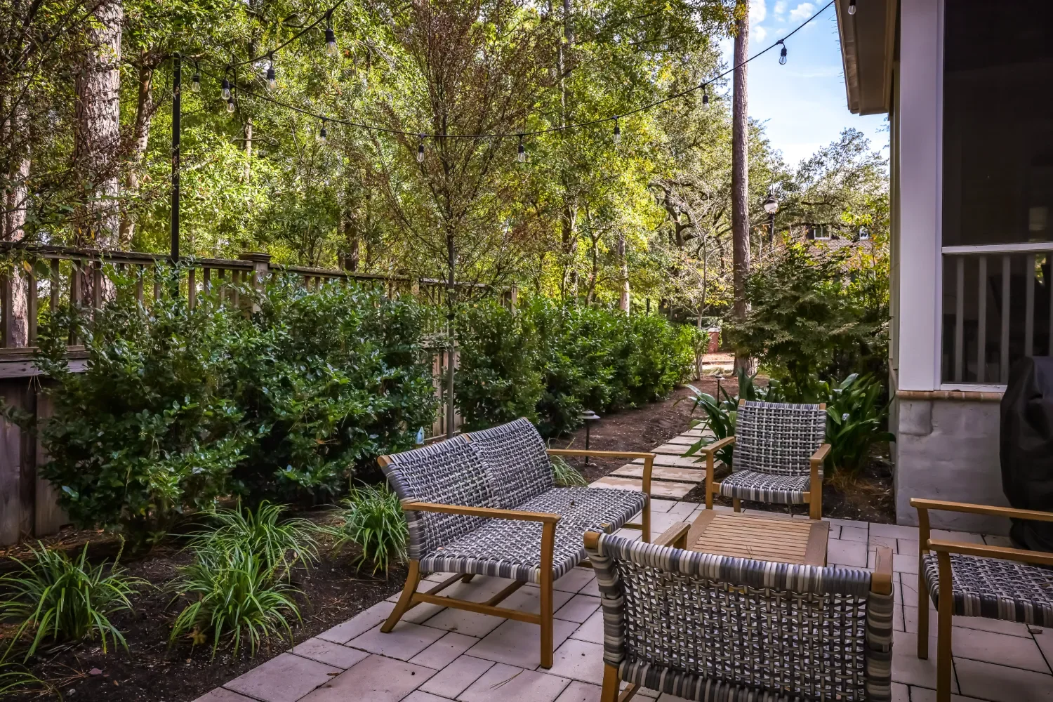 Outdoor living patio with weathered wood decking in Ogden, NC