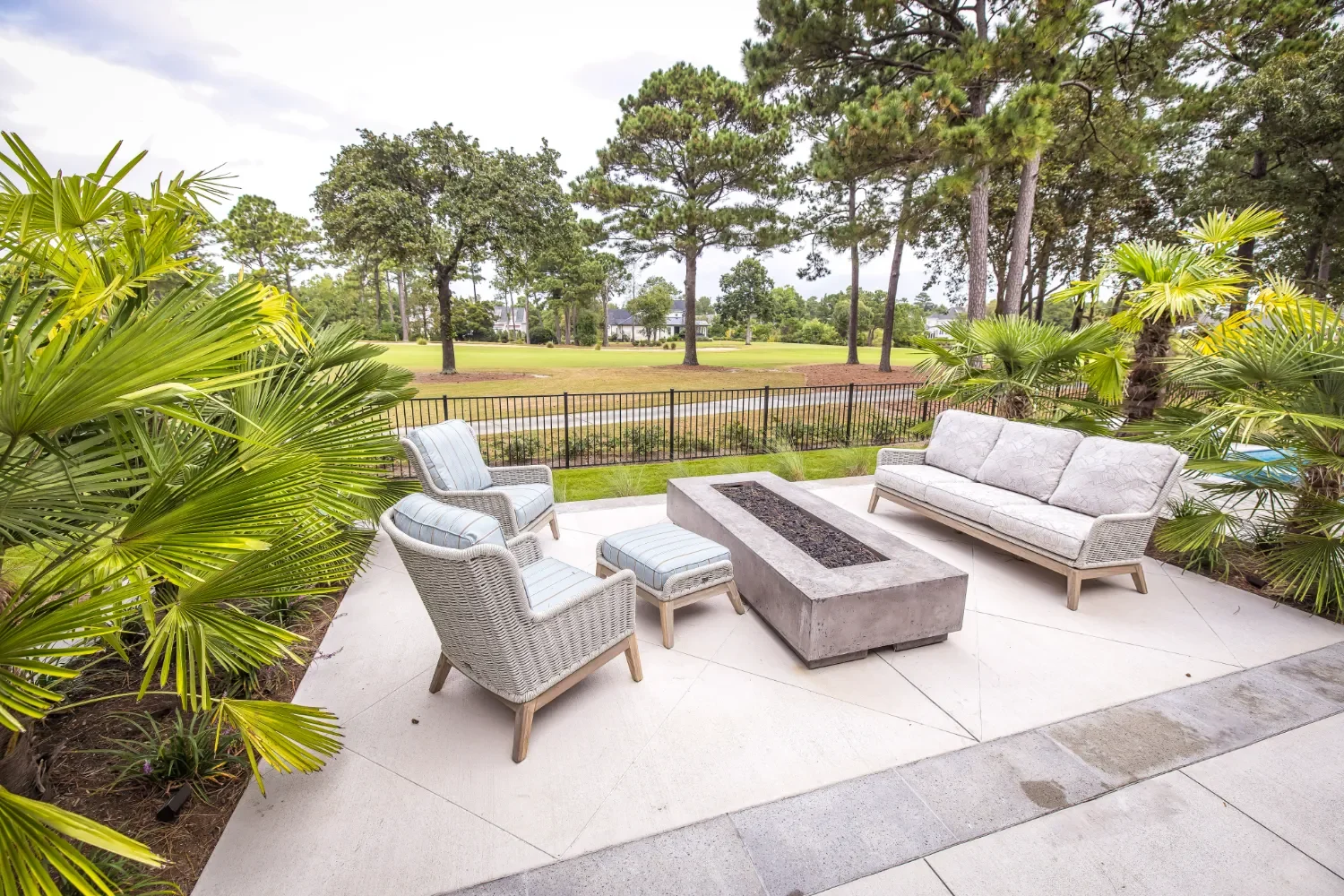 Patio in Landfall, NC with defined seating areas and smooth transitions to surrounding outdoor features