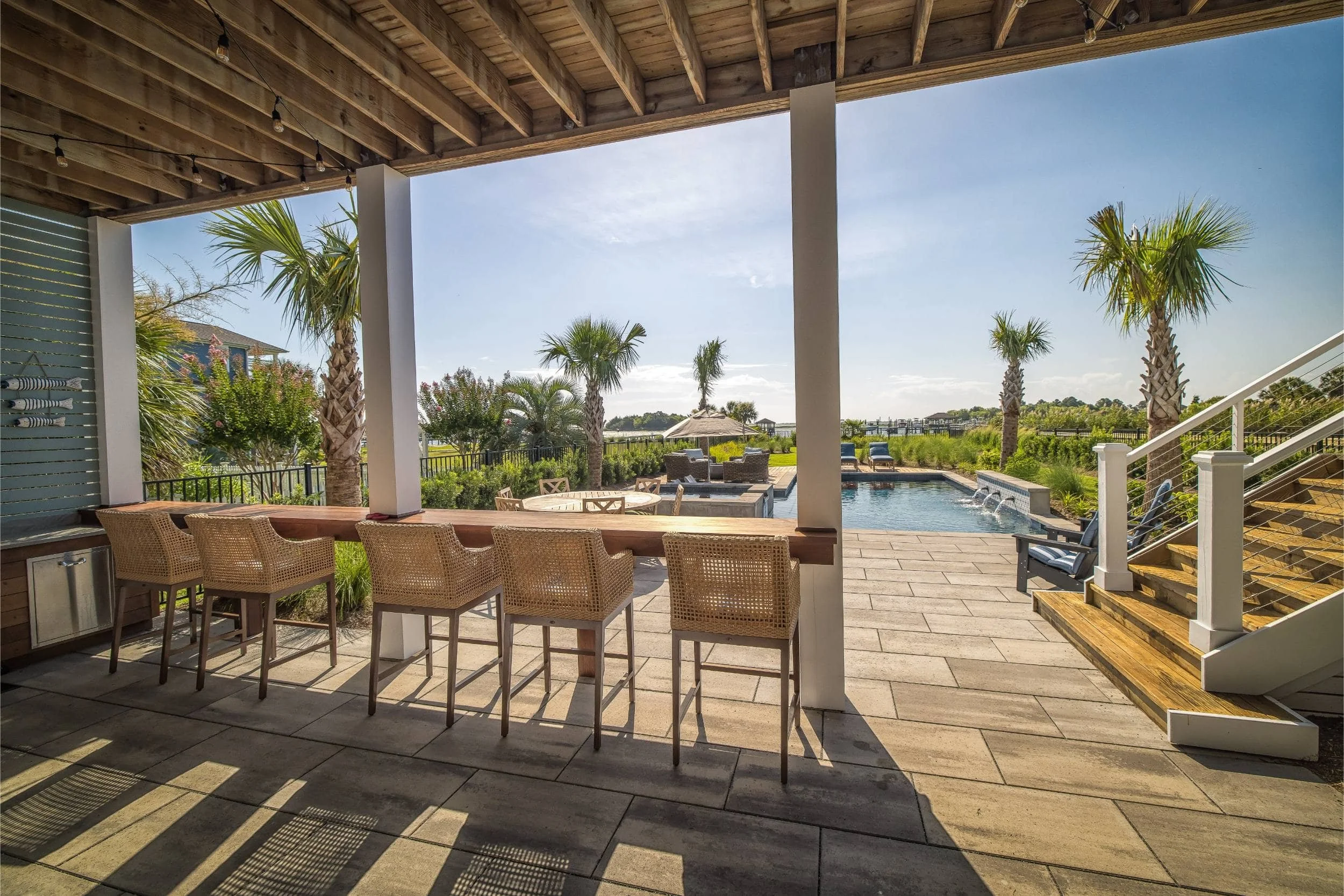 A lawn care and landscape design project with manicured greenery in Kure Beach, NC