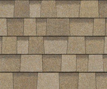 Close-up of a roof with brown shingles.