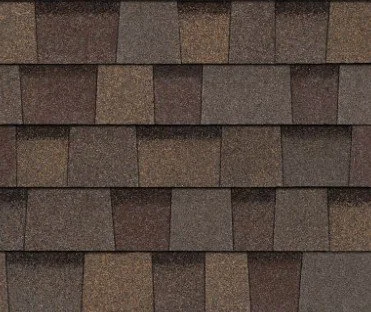 Close-up of brown asphalt shingle roof with overlapping rows.