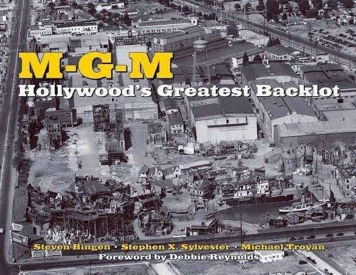 Book cover titled 'M-G-M Hollywood's Greatest Backlot' with author names Steven Bingen, Stephen X. Sylvester, and Michael Troyan, featuring an aerial photo of a backlot with buildings and streets.