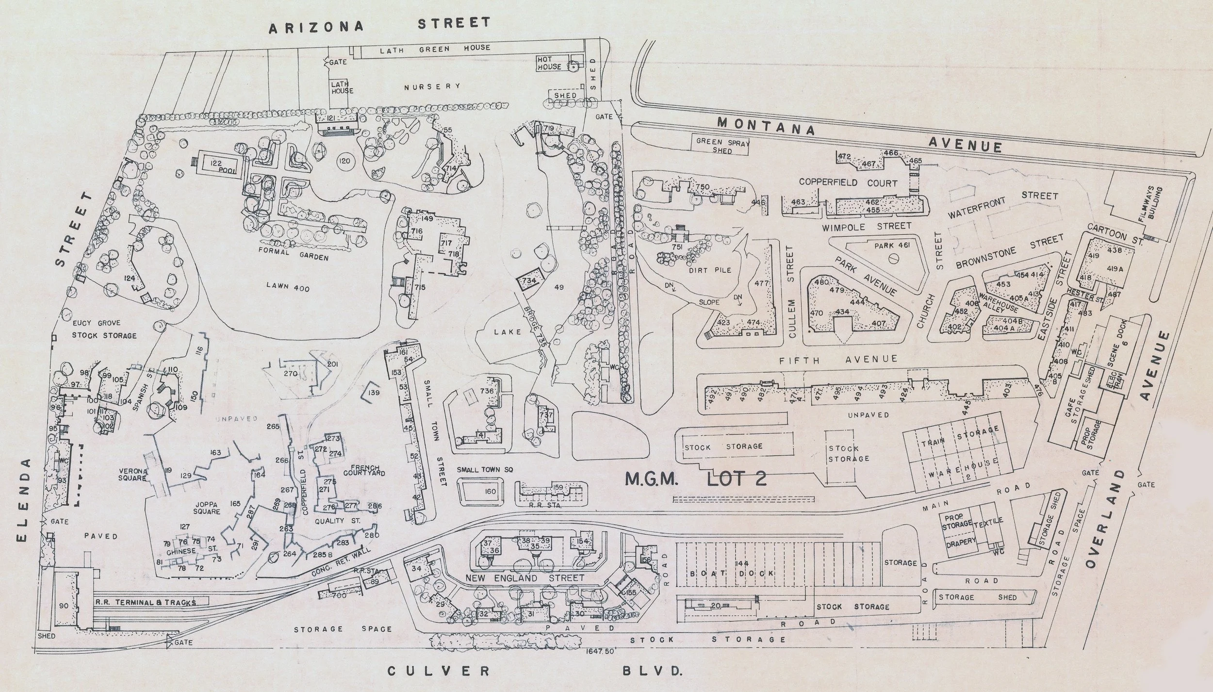 Map of a large area with labeled streets, buildings, gardens, parking lots, and various structures, including a lake, gardens, storage areas, and residential buildings.